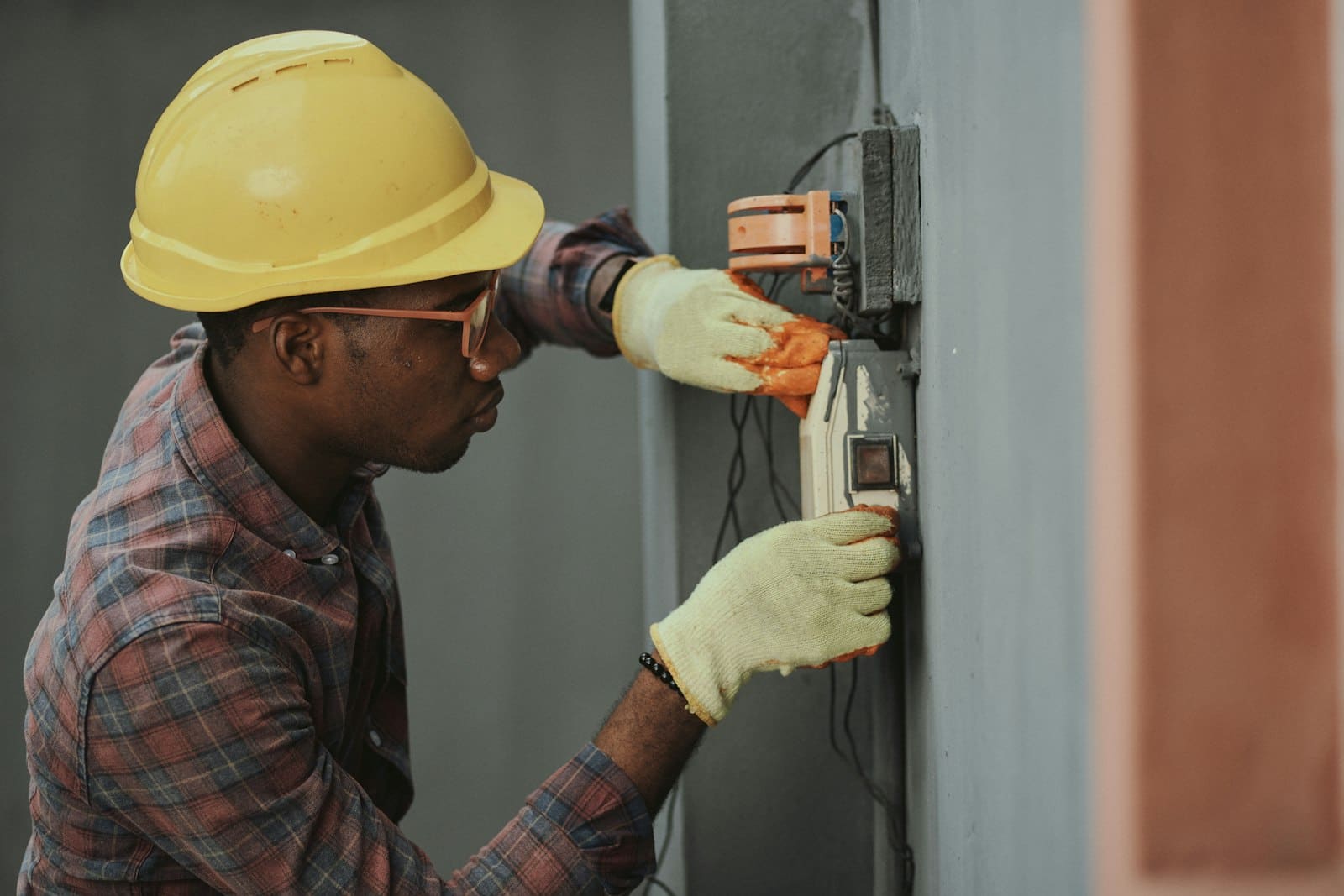 Electrician commissioning a control panel